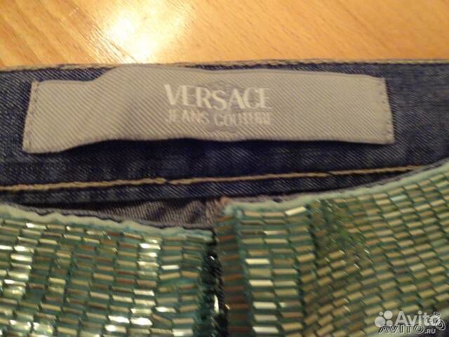 Джинсы versace