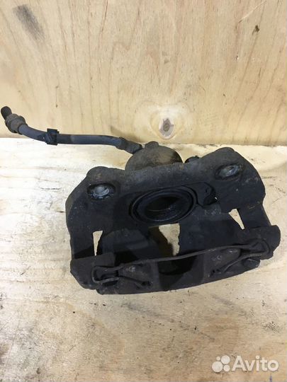 Суппорт передний левый Opel Astra H