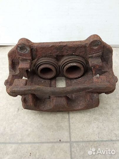 Суппорт тормозной передний левый Renault Espace 3