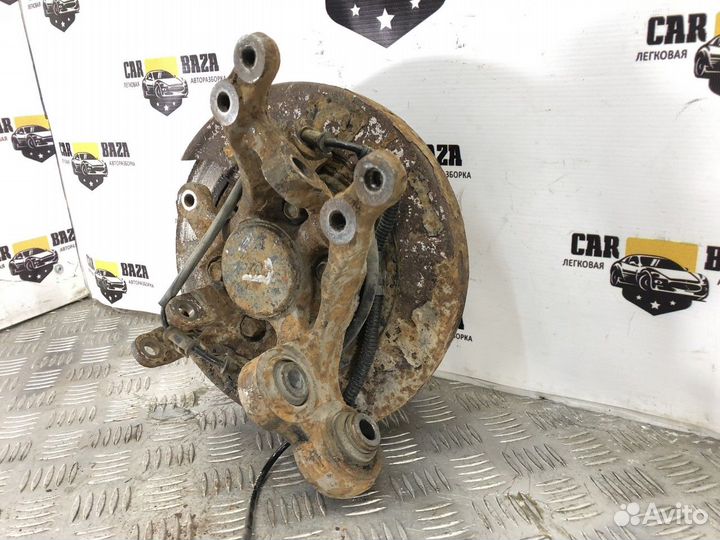 Кулак поворотный задний левый L Kia Magentis