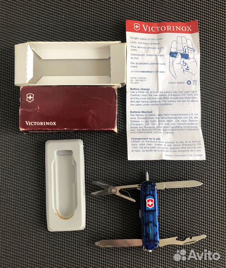 Карманный,нож от Victorinox С фонариком и ручкой