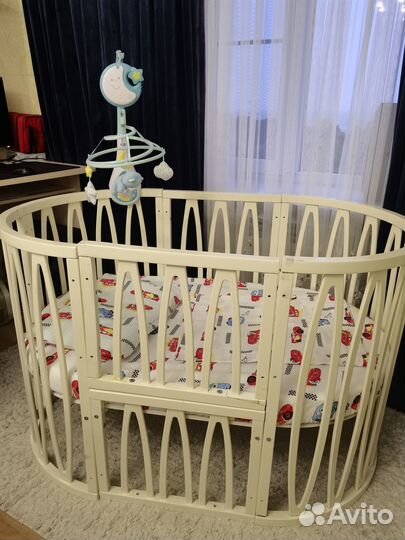 Детская кроватка трансформер с маятником