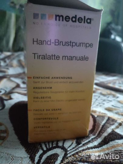 Молокоотсос medela ручной