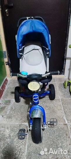 Трехколесный велосипед с ручкой