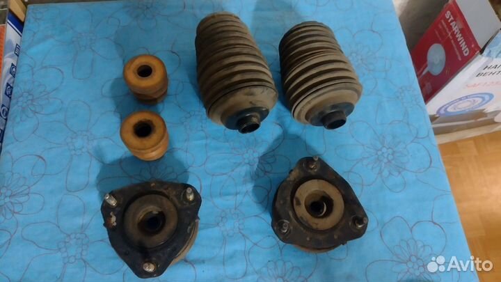 Опоры и пыльники передних амортизаторов Focus I