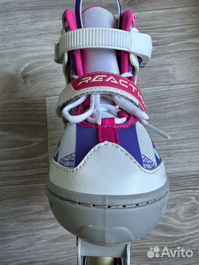 Роликовые коньки