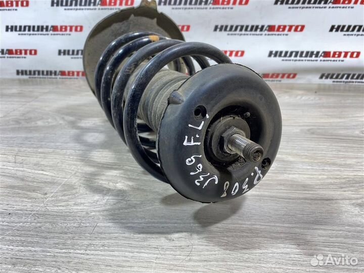 Амортизатор передний левый Пежо 308