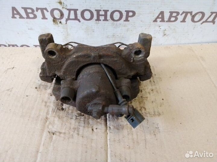 Суппорт тормозной передний правый Volkswagen