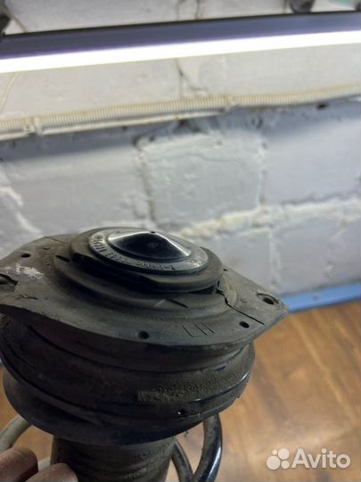 Стойка подвески передняя левая Nissan Tiida С11