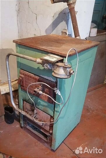 Отопительный котёл на газу и твердом топливе