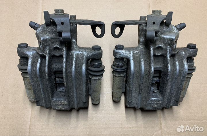 Суппорт задний Skoda Rapid