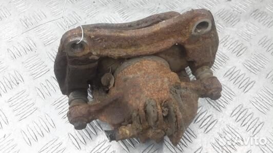 Суппорт тормозной передний правый mitsubishi caris