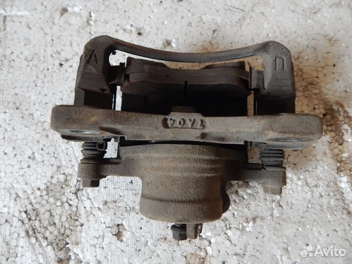 Суппорт тормозной передний левый Chevrolet Lacetti