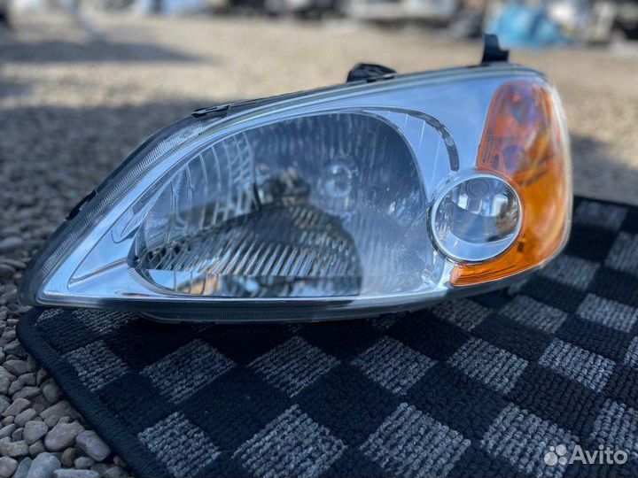 Фара левая Honda Civic Ferio ES1 D15B 2002