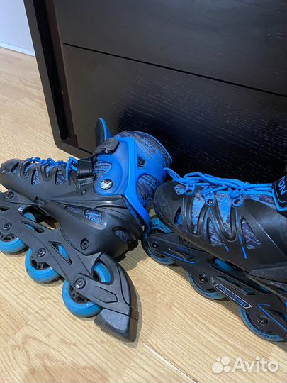 Роликовые коньки