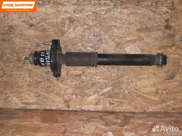 Стойка амортизатора задняя Mitsubishi Outlander