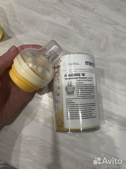 Молокоотсос medela ручной две бутылочки и соски