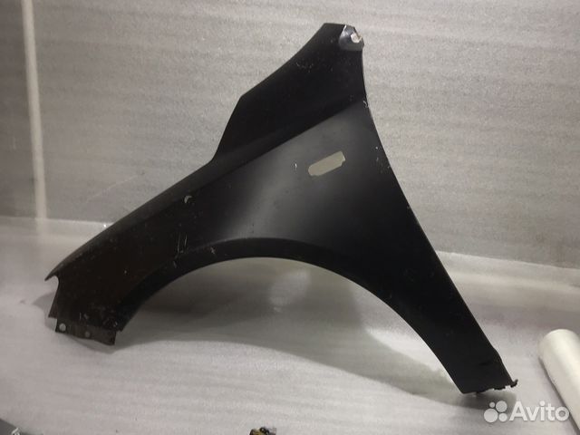 Крыло левое Kia Cerato (09-12г) поворотник