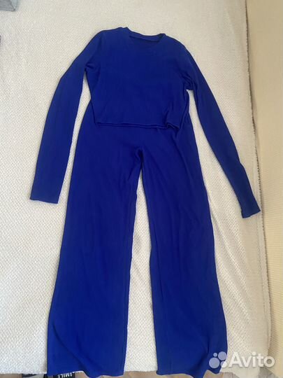 Женские костюмы, комбинезоны