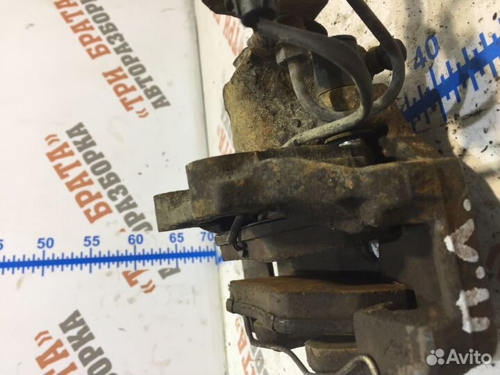 Фольксваген Пассат Суппорт передний Лев