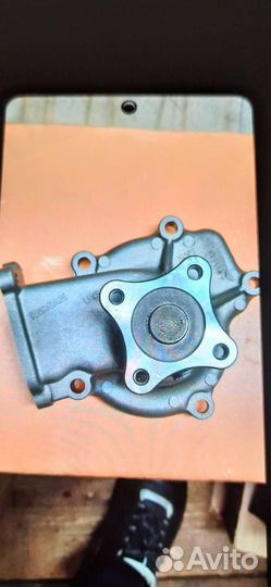 Водяная помпа на Nissan Sunny