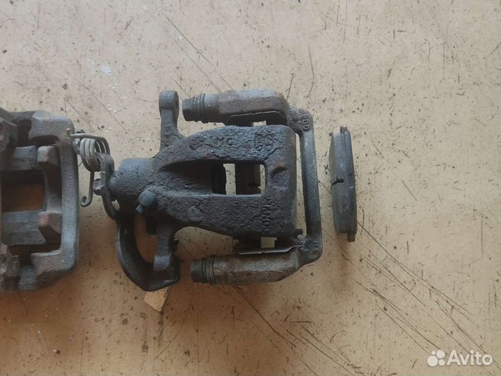 Суппорт тормозной задний Kia RIO 3 Solaris