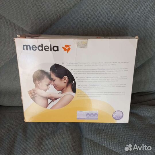 Молокоотсос medela электрический