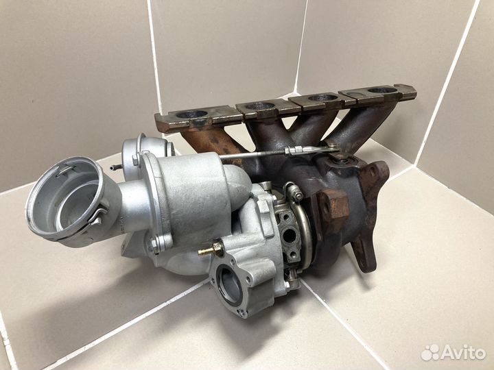 Турбокомпрессор (турбина) 06J145701J VAG