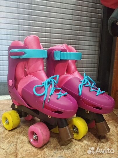 Роликовые коньки