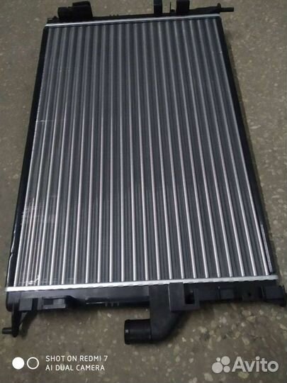 Радиатор Рено Логан,Сандеро,Дастер,Ниссан Альмера