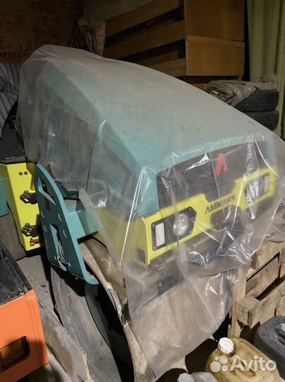 Машинист катка