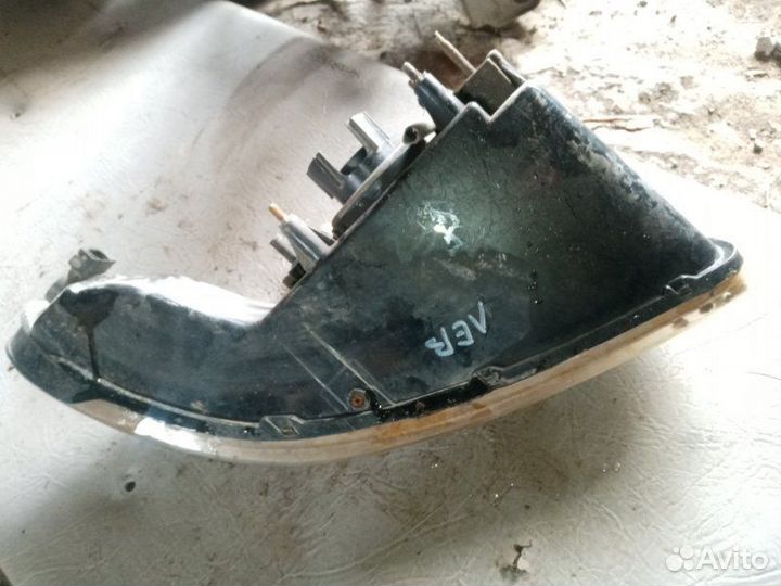 Фара передняя левая Dodge Caravan grand 3.3 1997