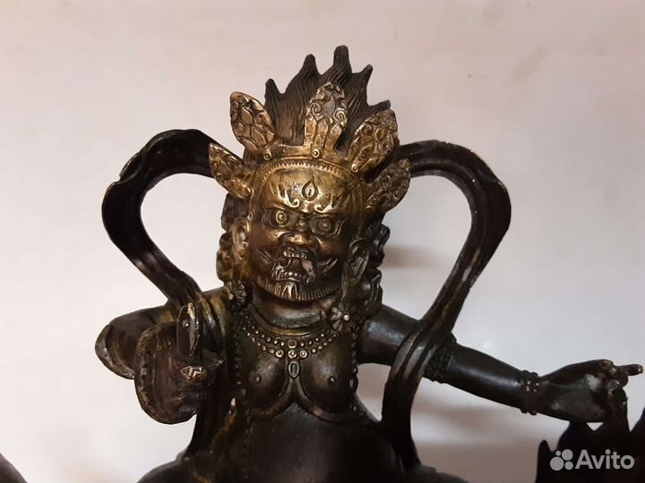 Будда на драконе-единороге.Бронза