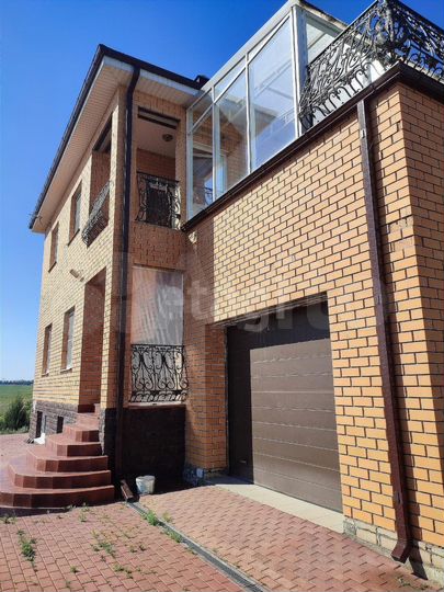 Коттедж 325 м² на участке 63 сот.