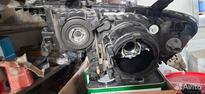 Фара левая mitsubishi Pajero Sport 09) / L200 05-1