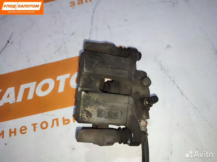 Суппорт тормозной задний правый Mitsubishi Lancer