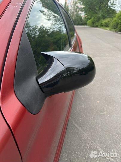 Накладки на зеркала Pegeot 206