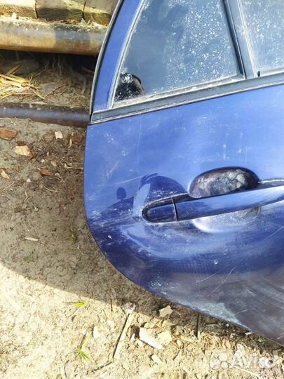 Двери toyota corolla е150