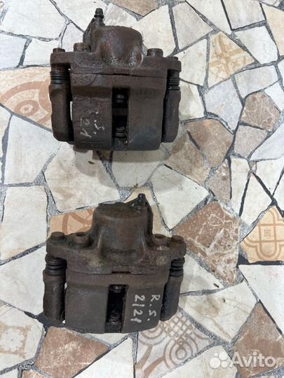 Суппорт тормозной Renault Symbol седан 1.4