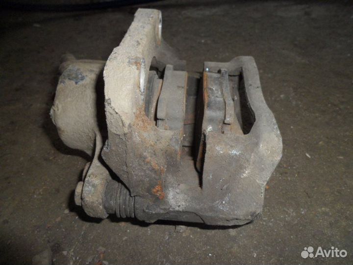 Суппорт передний правый Renault Logan LS0G K7J710