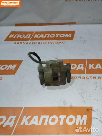 Суппорт тормозной задний левый Mitsubishi Lancer