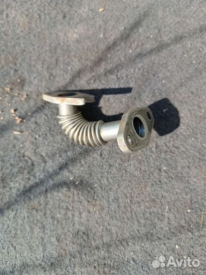 Трубка слива масла с турбины Опель Астра h