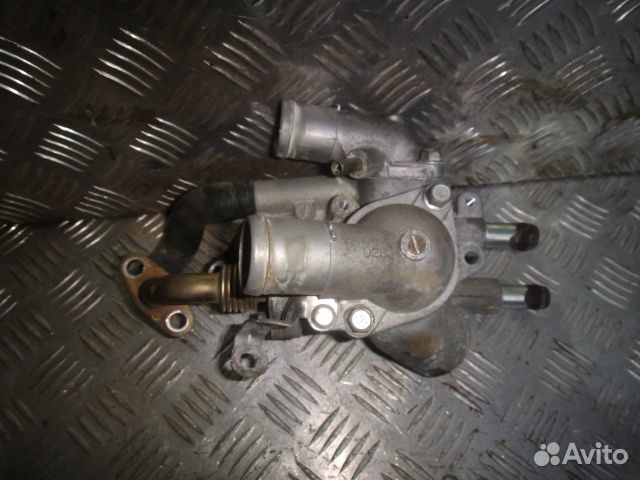 Корпус термостата Lancer 10 (07-10) /Outlander XL