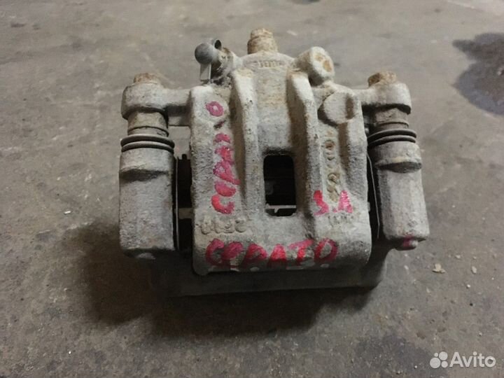 Суппорт задний левый (Kia Cerato)