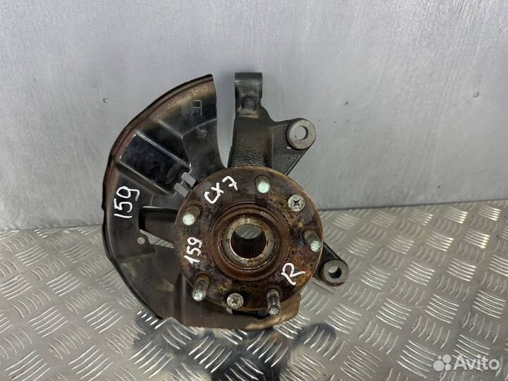 Кулак поворотный передний правый Мазда Сх7