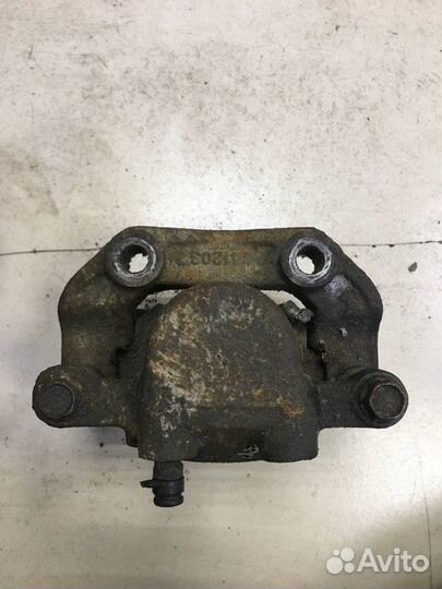 Суппорт тормозной задний левый SsangYong Kyron