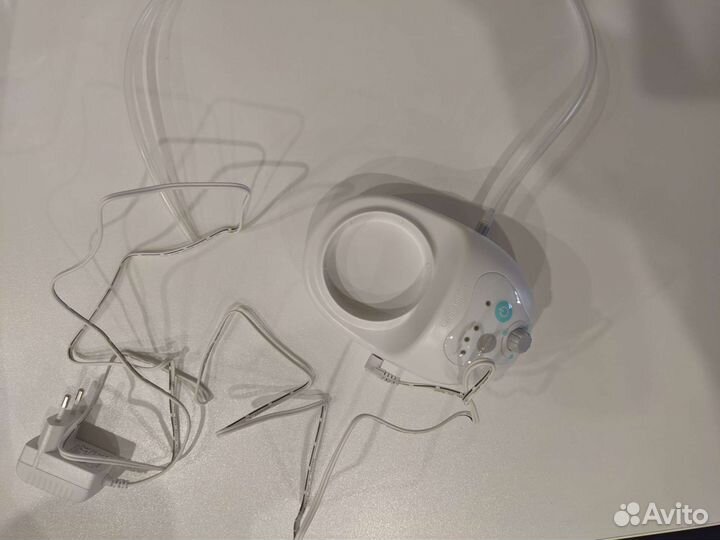 Молокоотсос электрический