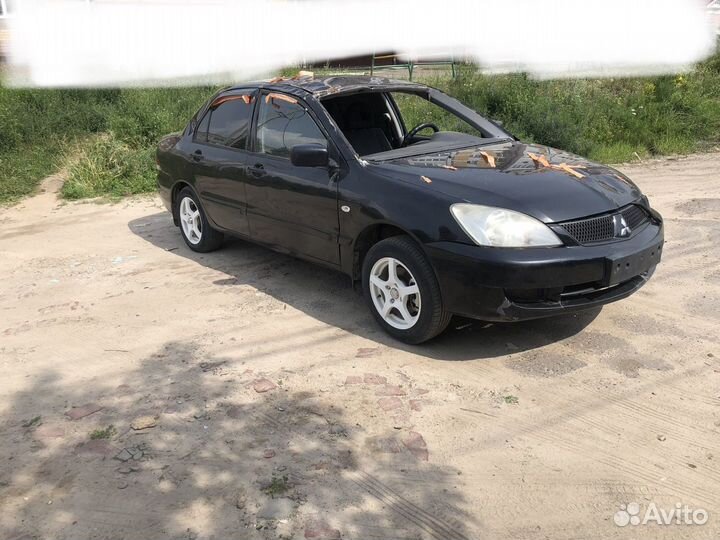 В разборе Mitsubishi Lancer 9 лансер 4g18 1.6