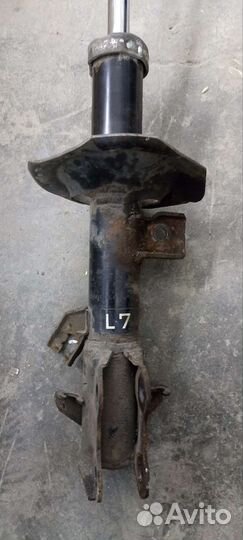 Амортизатор nissan tiida