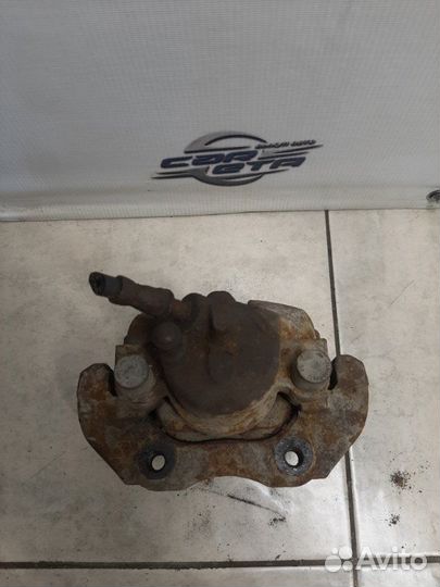 Суппорт тормозной передний левый Ford Focus седан